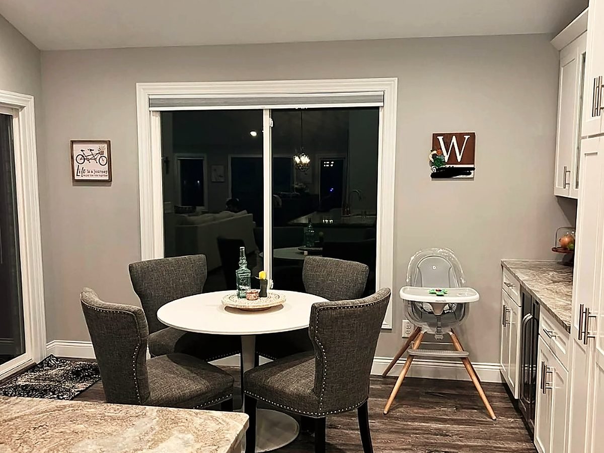 Dining and kitchen area repainted by Royal Surface Painting, Calgary