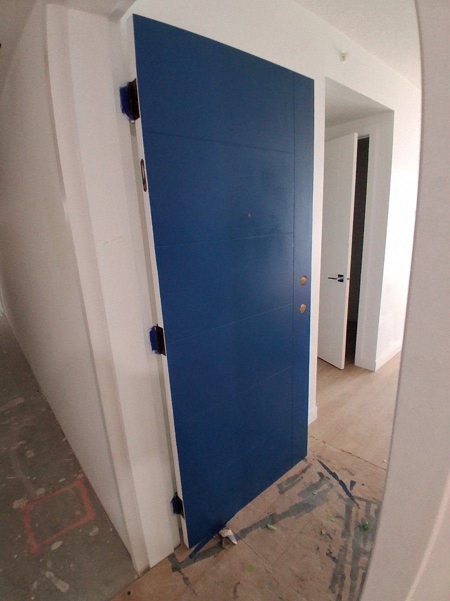 Cobalt blue entry door by Royal Surface Painting, Calgary