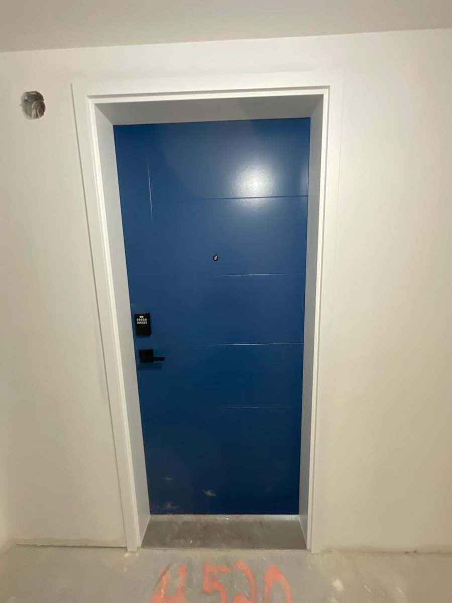 Indigo blue entry door by Royal Surface Painting, Calgary