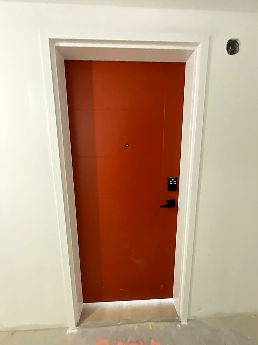 Rust coloured feature door by Royal Surface Painting, Calgary