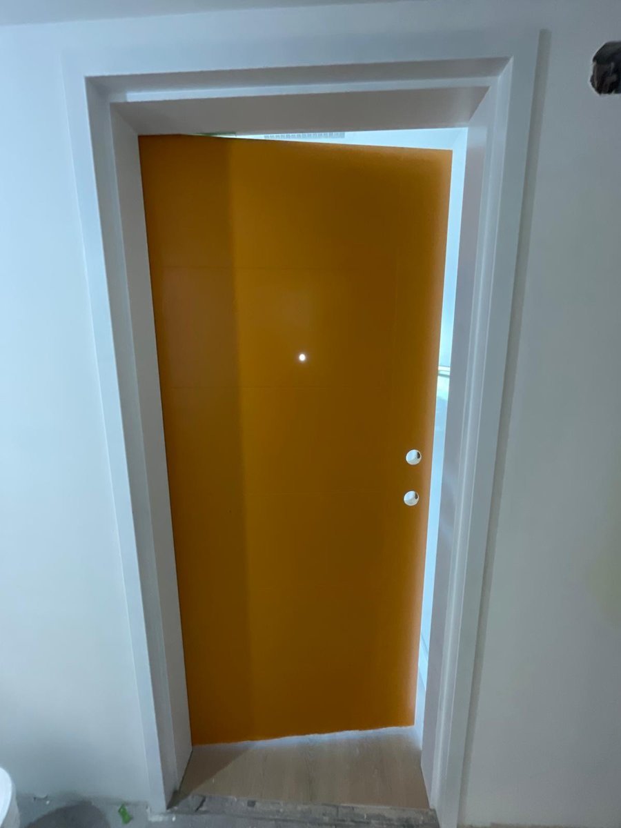 Saffron gold entry door by Royal Surface Painting, Calgary