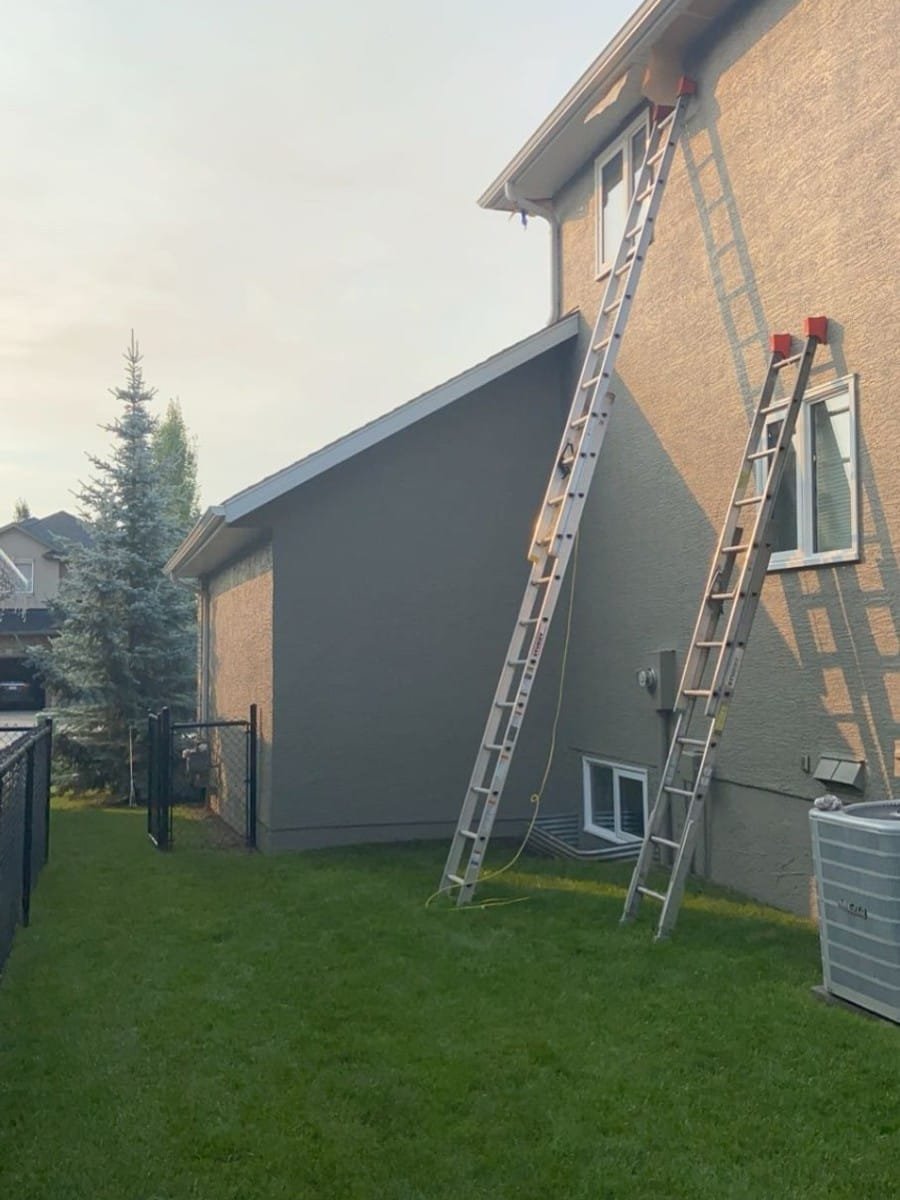 Exterior siding repaint by Royal Surface Painting, Calgary