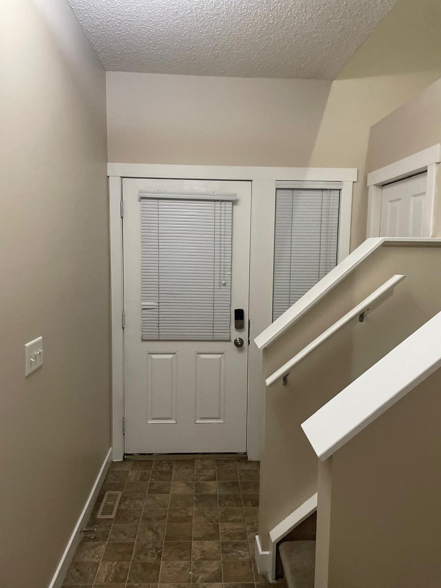 Repainted hallway and stairwell by Royal Surface Painting, Calgary
