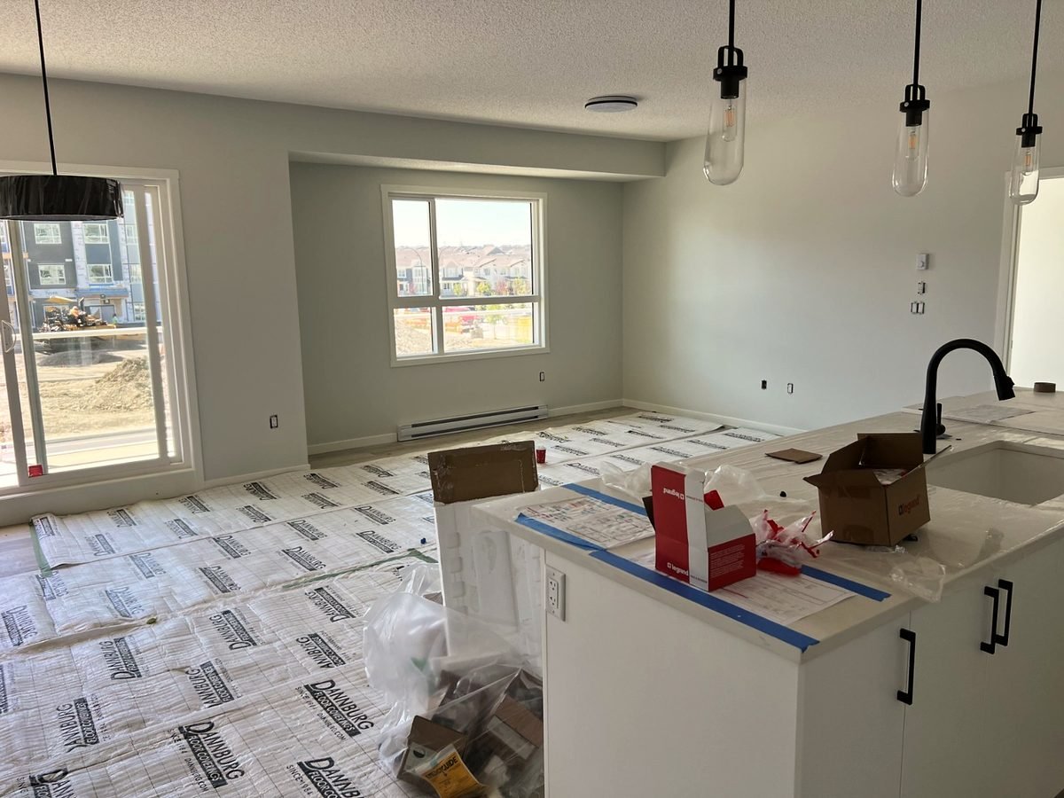 Kitchen island and walls repainted by Royal Surface Painting, Calgary
