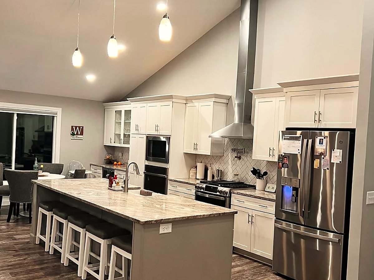 Kitchen and cabinets repainted by Royal Surface Painting, Calgary
