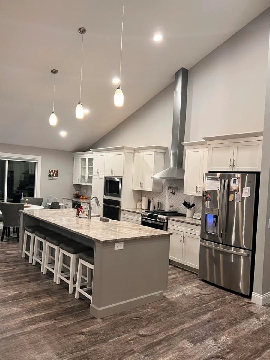 White kitchen cabinets repainted by Royal Surface Painting, Calgary